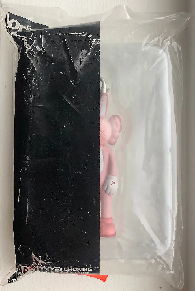 Kaws Pink Accomplice Keychain 1