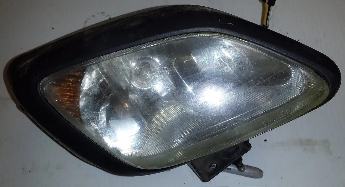 Suzuki Vinson 500 Right Headlight 1