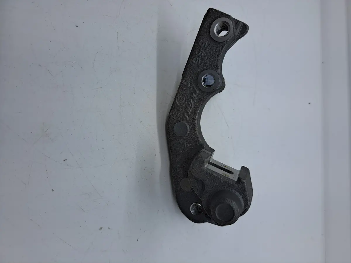 Suzuki Front Brake Caliper Bracket 1